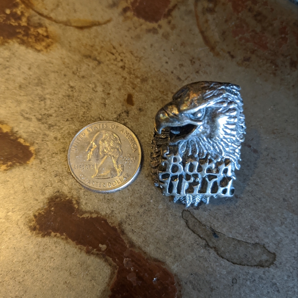 Silver toned carved eagle born wild ring sized 8.5